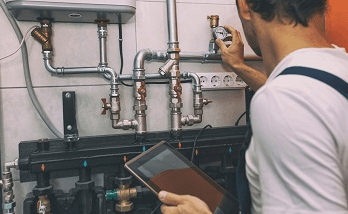 engineer checking gas valve
